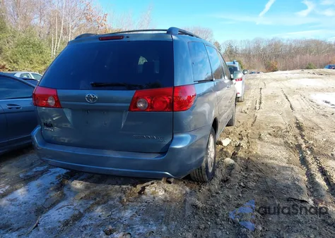 2009 Toyota Sienna Xle z USA, uszkodzony, nr VIN 5TDBK22C99S025916